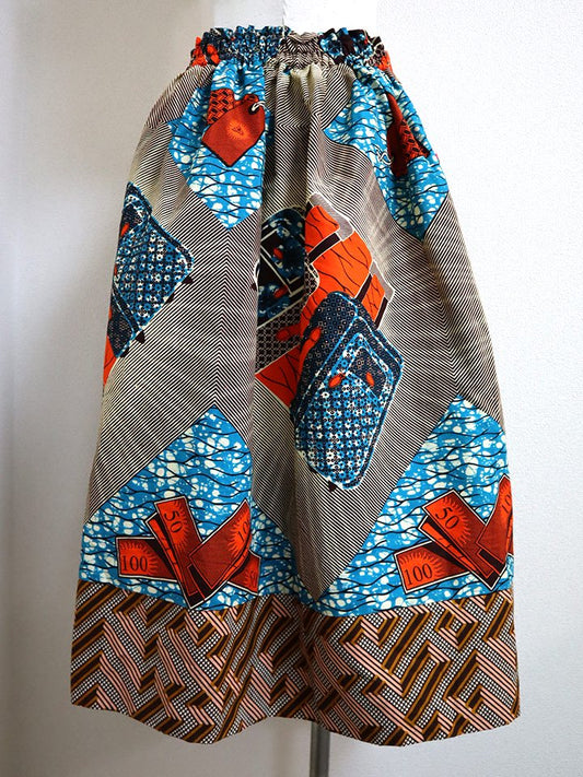 ポケット付きギャザー切り替えスカート・お札とスーツケース