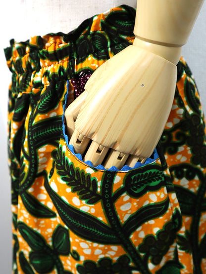 ポケット付きギャザー切り替えスカート・オレンジ×ボタニカル