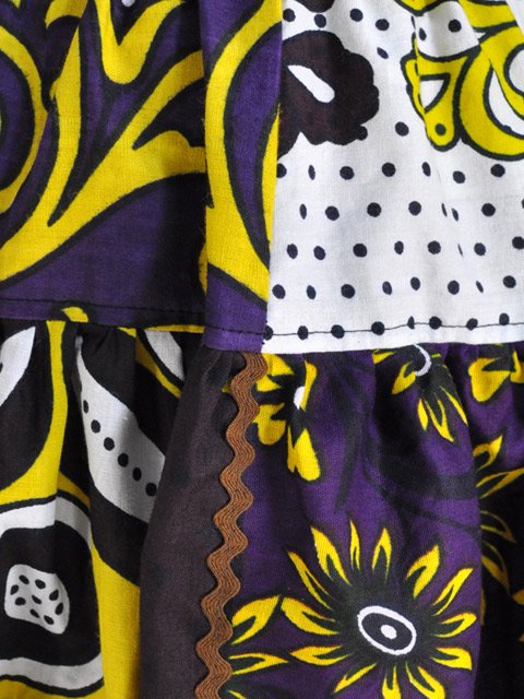 カンガのパッチワーク膝丈スカート・黄色の花と紫ペイズリー